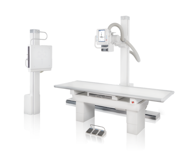 Medical radiography setup with an adjustable patient table and an overhead control monitor on a vertical column.