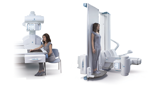 Patient seated at a ct scanner on the left and a standing imaging system with a patient on the right in a clinical room.