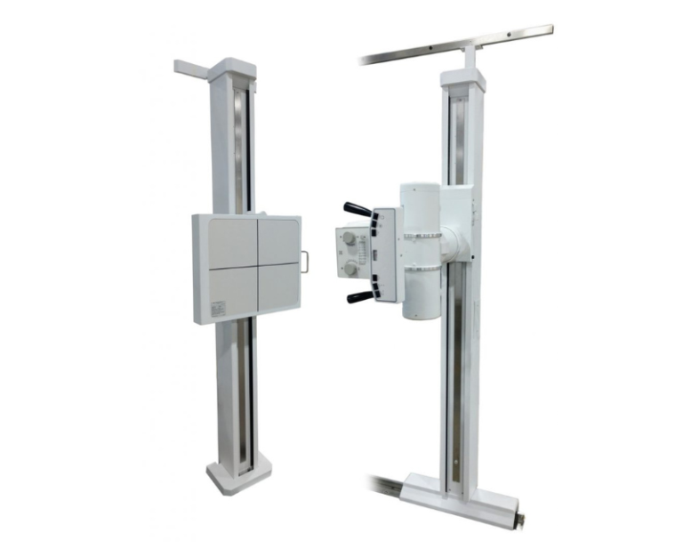 Industrial x-ray imaging system with two upright columns and a movable imaging head facing a control panel.