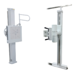 Two white radiography machines on tall stands facing each other, with control panels and patient positioning arms.