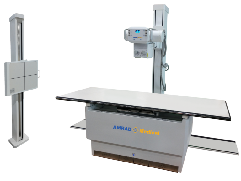 Medical x-ray imaging table with vertical imaging stand and control console; amrad medical branding visible on the unit