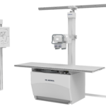 Medical x-ray imaging system with a flat patient table and vertical support column labeled del medical.
