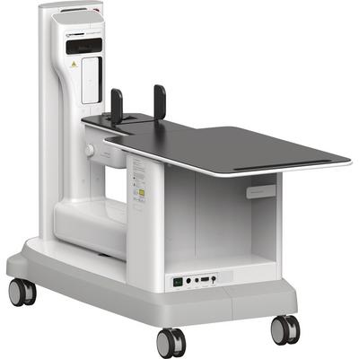 Mobile x-ray imaging system on wheels with a foldable patient table for bedside radiography.