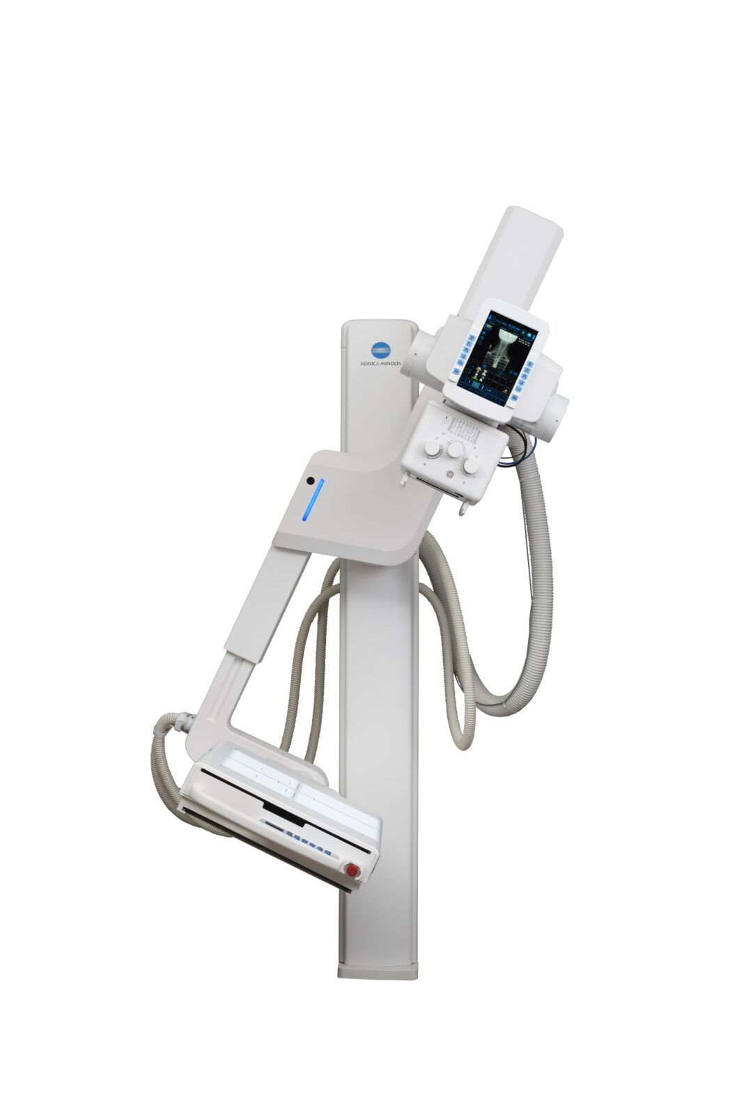 Medical imaging device on a tall white stand, with a control panel and screen attached, white and grey with cables.
