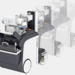 Autonomous warehouse pallet forklift robot for automated material handling. It appears to lift and move pallets in a storage facility.