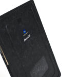 Back of a black aerodr device with a blue konica minolta logo