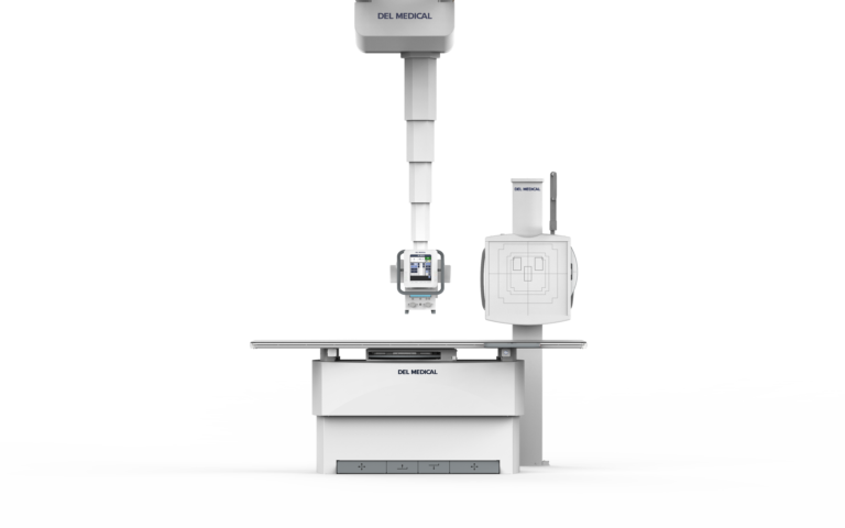 Full-height view of a del medical radiography system with a vertical support gantry, control console, and patient table.