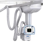 Ceiling-mounted medical anesthesia machine with multiple flexible hoses and a small digital control panel.