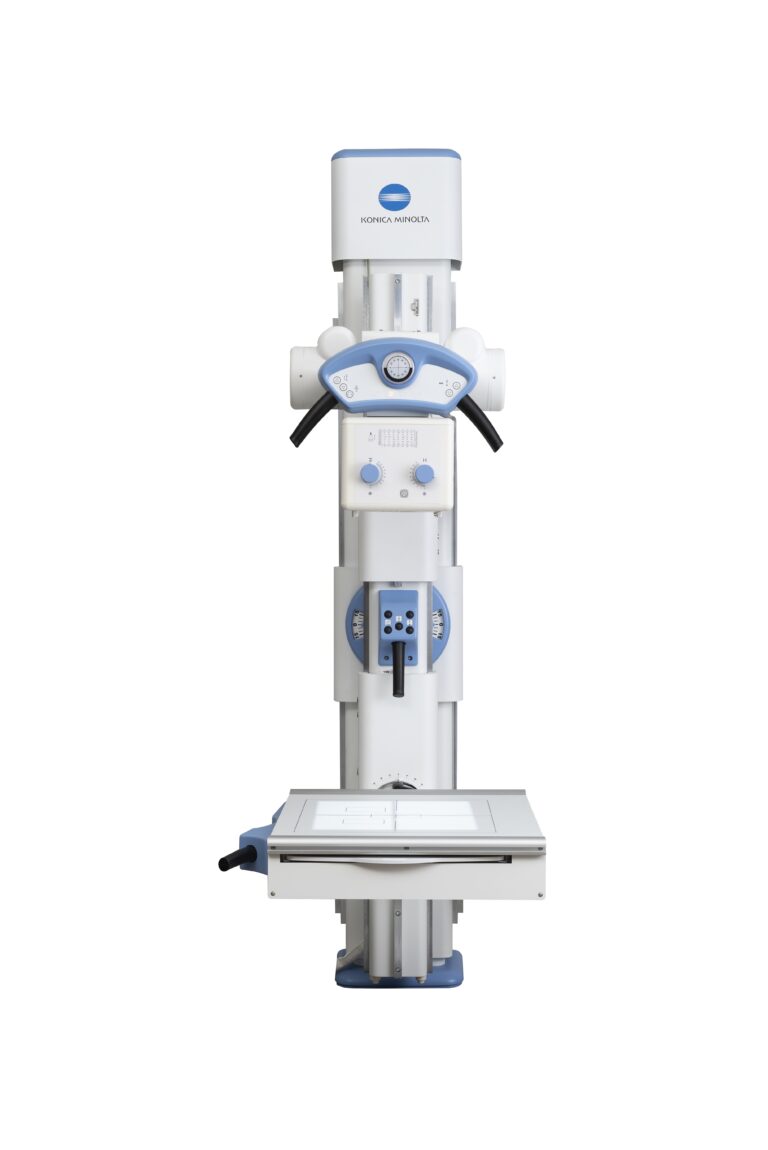 Vertical konica minolta radiography machine with blue controls and patient table