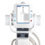Medical ventilator with a central touchscreen display and control dials, connected hoses on both sides.
