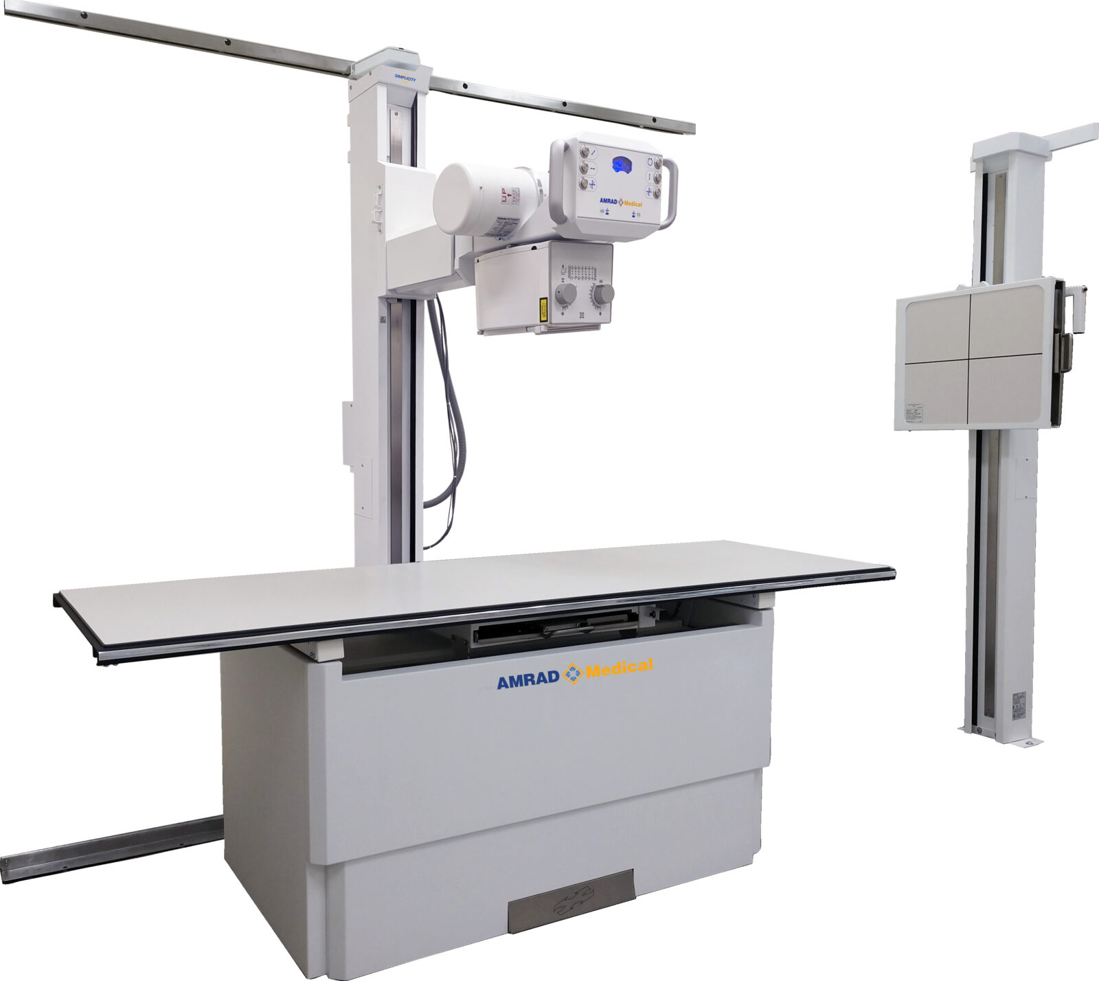 Medical x-ray imaging system on a stand with a horizontal table and a control console labeled amrad medical.