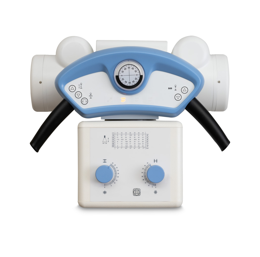 Blue-curved medical instrument with gauge at center and two round handles, mounted on a white base with blue knobs; looks like a diagnostic/therapy device.