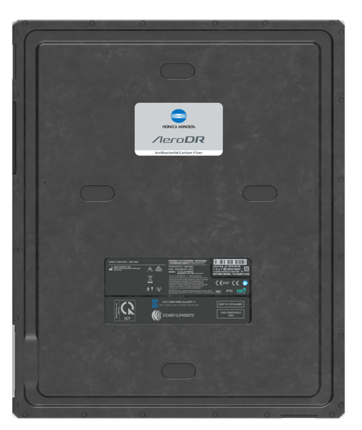 Rear view of a black konica minolta aerodr detector with a centered sticker label and engineering details on a metal backplate