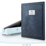 Blue konica minolta aerodr flat-panel detector standing upright beside its light-blue reader on a white table.