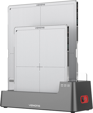 Two vieworks cr/dr plate readers resting in a grey charging dock for imaging plates.