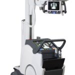 Portable x-ray machine on a wheeled stand with a monitor showing a chest x-ray and a touchscreen control panel below