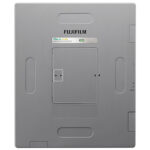 Bottom view of a gray fujifilm device showing a central battery/compartment door and recessed handles on each side.