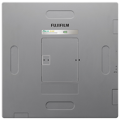Back panel of a fujifilm device with the battery compartment door open, showing the small door and status lights above it.