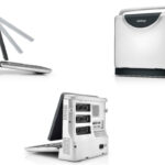 Set of three office binding and laminating machines: a comb binding machine, a laminator, and a binding punch unit.